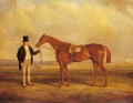 Un caballero sosteniendo un caballo peligroso John Ferneley Snr